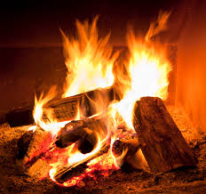 Wood in teepee shape with paper balls at bottom Are You The Firewood Or The Fire