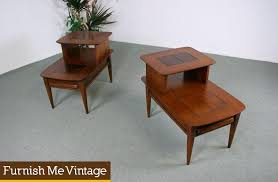 Its eased edges and clean lines transform any environment into a comfortable and inviting space. 2 Retro Stanley Step Tables With Tile Accent