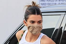 Right before she went away to paris, she was in vegas promoting her new tequila brand, 818, when. Kendall Jenner Slips On Silk Mini Dress Skims Mask Big Toe Sandals Footwear News