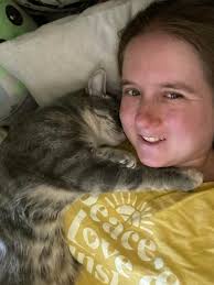 Cat masters dangle sneeze technique