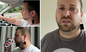 YouTube prankster puts a locked padlock through her boyfriends pierced ear 