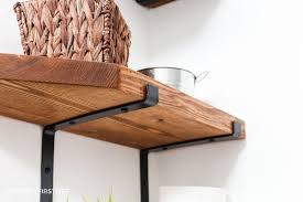 Learn how to make these modern wood shelf brackets. How To Create Diy Farmhouse Shelves With Metal Brackets