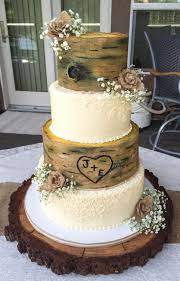This Rustic Wedding Cake Is A Great Mix Of Lace And Wooden Elements That Look Like A Tree Country Wedding Cakes Fake Wedding Cakes Cool Wedding Cakes