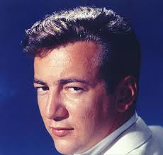 As long as I'm singing There's a bell up in my brain that's ringing Making  a crazy ding dong And if this band don't desert me Then there's nothin' in  the world