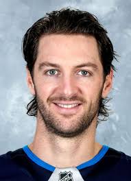 Player photos for the 2010-11 Soo Greyhounds at hockeydb.com