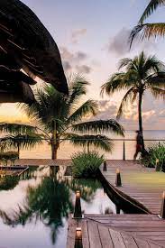 There Are Plenty Of Places To Find Divine Views Of The Beach In Mauritius This Is A Stunnng Photo During Sunset At Troux Aux Bic Resort Resort Spa Golf Resort