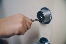 High Res Key In Hand Unlocking Door Picture Free Images