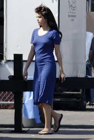 It's art, a hug from a loved one. Selena Gomez In Blue Dress On Set Parental Guidance Suggested 04 Gotceleb