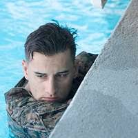 Col. Tadisha Tanida, Left, poses for a picture with