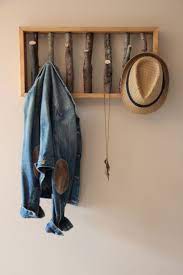 15 Cool Coat Racks That Really Branch Out Diy Coat Rack Wooden Coat Hangers Coat Hanger Diy