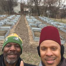 Sons of the American Revolution present flag certificate to Comfort Farms