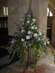 Add filler flowers and greenery to the foam block to fill in any holes in the arrangements. Church Flower Arrangements Eden Of Chorley