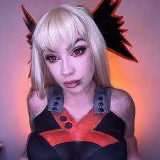 Swipe to see the first attempt years ago ! I was also wearing the head  piece in the first look upside down so that's progress in its self! 😂  #bakugou #katsukibakugou #bakugoucosplay #