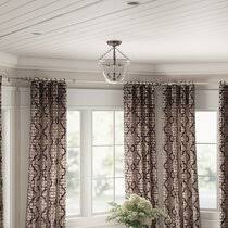 The soft pink mixed with the black accents make this room a fun retreat. Curved Window Curtain Rod Wayfair