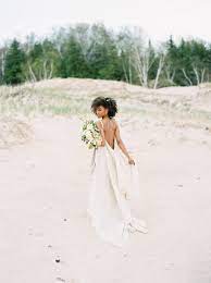 Beach weddings are so romantic. 33 Beach Wedding Dresses Real Brides Wore That We Love Martha Stewart