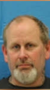 Man arrested for breaking and entering, drug charges