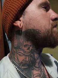 Looking for a tattoo that has ravens flying out of a wolf's open mouth
