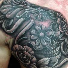 Creative skull tattoo design on back of hand. 155 Sugar Skull Tattoo Designs With Meaning Wild Tattoo Art