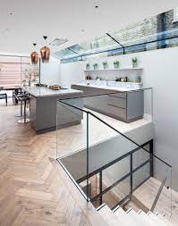 Kitchen And Stairs Down To Basement Glass Balustrade Open Plan And Timber Parquet Flooring Finch House Stairs In Kitchen Kitchen Flooring Glass Balustrade