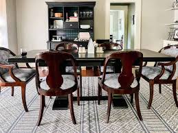 Larger rugs 8'x11' in size are just the thing to anchor your dinner table. Go Big Or Go Bare How To Tell The Size Rug For Your Dining Room Design Morsels
