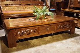 The distressing marks make this a true statement piece. Reclaimed Teak Carved Coffee Table Bali Furniture Coffee Table Indonesian Furniture