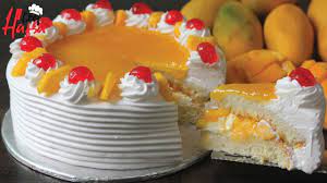 Now run a butter knife around the circumference of the cake to rlease it. Mango Cake Without Oven With Eggs Eggless Without Oven Mango Cake Recipe Youtube