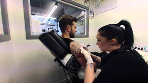 A little bit of a throwback to when a tattoo shop was not a boutique or a hangout. Muse The Resistance Tattoo Youtube