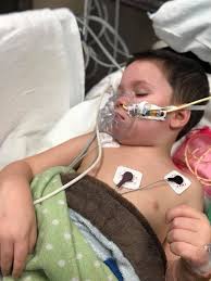 Carson's breathing has been extremely labored and fast since yesterday  evening. After consulting with his home health nurse and oncologist we  decided to go to the ER for a chest X-ray because