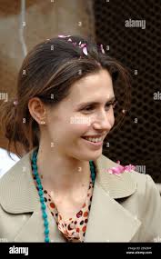 La première dame syrienne Asma El Assad se joint aux agriculteurs pour  rassembler les célèbres roses de Damas dans le village d'Al Mara, à 60  kilomètres au nord de Damas, en Syrie,