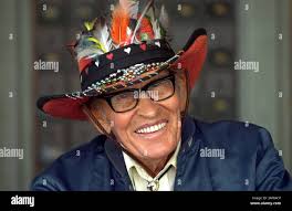 Hat is adorned feathers for hi-res stock photography and images