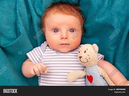 My cousin (caucasian) had a baby with his japanese wife and the baby has blue eyes, but i know that baby's eyecolor changes a lot and doesn't settle for like 9 months? Portrait Newborn Baby Image Photo Free Trial Bigstock