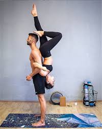 Awesome Couple Yoga Poses That Will Make You Feel Healthy Everyday Couple Yoga Couple Yoga Poses Yoga E Couples Yoga Poses Couples Yoga Difficult Yoga Poses