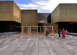 Playing On These Swings Outside An Arts Centre In Guimaraes Portugal Generates Electricity To Power Lightin Architecture Facade Architecture Installation Art