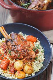 Mediterranean Style Wine Braised Lamb Shanks Recipe The Mediterranean Dish Braising And Slo Braised Lamb Shanks Lamb Shank Recipe Braised Lamb Shanks Recipe