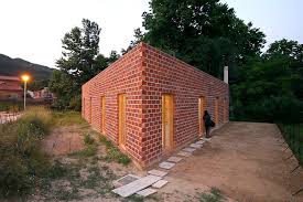 Surrounded mostly by water, the city has amassed one of the largest and most varied collection of skyscrapers in the H Arquitectes Unique Triangular House 712 Is Constructed From Perforated Bricks