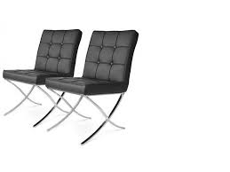 Two dining table chairs with dark wood legs. Barcelona Dining Chairs Schwarz 2er Set