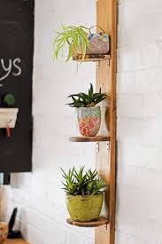 Now the shelf doesn't have the sharp edged tabletop anymore. How To Make Diy Plant Shelves Using Wood Slices Pillar Box Blue