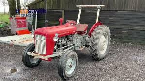 Image result for Gray 1965 Tractor