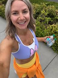 My outfits I wore to Disneyland last week!🩷 Stitch 70th anniversary Daisy  bound for In park workout Minnie cherry Daisy again, she loved it so much  she stole my bag🤣 sully with