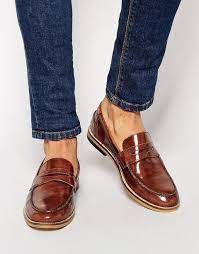 The men's burgundy penny loafer is the perfect fall transitional shoe because it goes with eveything — and you can find a pair at every price point. Handmade Men Brown Moccasin Shoes Men Loafers Dress Shoes Men Loafers Men Dress Shoes