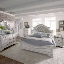 Magnolia manor bedroom set dramatic arched crown graceful lines and decorative moldings bracket feet full extension metal side glides bottom case dust proofing fully stained interior drawers this bedroom set includes: Liberty Furniture Magnolia Manor 4 Piece Antique White Queen Upholstered Bedroom Set 244 Br Qubdmn Miskelly Furniture