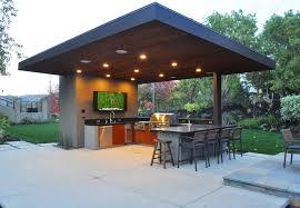 For the perfect mix of sand and swank, backyard kitchen & tap offers silky wooden walls which open onto lush outdoor cabanas, fire pits, and an indoor/outdoor bar. You Ll Love These 10 Outdoor Kitchen Designs Pool Spa News