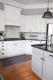 Here are my recommendations of wall colors that go great with white cabinets. Bower Power S White Kitchen With Hexagon Marble Tile Backsplash Backsplash Kitchen White Cabinets Kitchen Design Backsplash For White Cabinets