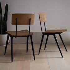 Steal This Look An English Kitchen With A Rustic Modern Edge Remodelista Dining Chairs Metal Dining Chairs Modern Kitchen Chair