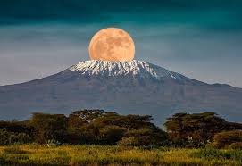 The Full Moon Rises Over Mount Kilimanjaro Tanzania Africa February 19 2019 Pics Mount Kilimanjaro Trekking Tour Kilimanjaro