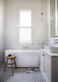 Textured finishes and graphic mosaic tile patterns are in. 37 Black And White Mosaic Bathroom Floor Tile Ideas And Pictures Bathroom Inspiration Amazing Bathrooms Small Bathroom