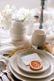 A Harvest Gathering With Foraged Flowers And Artisanal Decor Fruit Wedding Dried Fruit Decor Citrus Themed Wedding