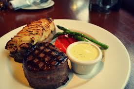 Our Tender Filet Mignon Wrapped In Applewood Smoked Bacon With Our Signature Twice Baked Potato And Traditional Bearnaise Sauce Cooking Recipes Food Cooking