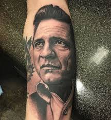 Cash portrait from around 2 years ago. This tattoo healed and settled  great! Personally I like the healed version better than when they are fresh  and irritated. Would love to more 60s-70s-80s