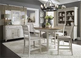 The sleek design gives you the flexibility to move around easily. Farmhouse Reimagined 5 Piece Gathering Counter Height Table Set In Antique White Finish With Chestnut Tops By Liberty Furniture 652 Dr 5gts